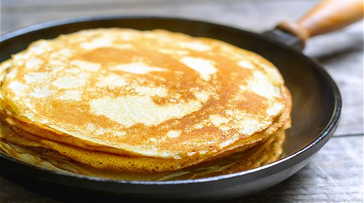 pancakes cooking in a pan