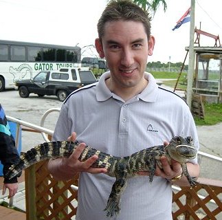 Paul Denton with baby aligator